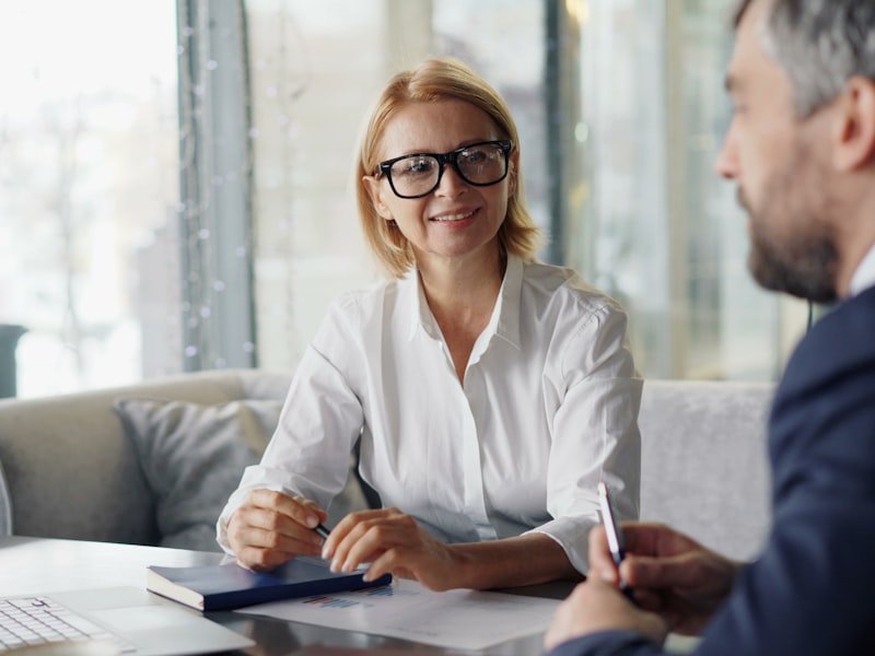 A couple reviewing finances at a table